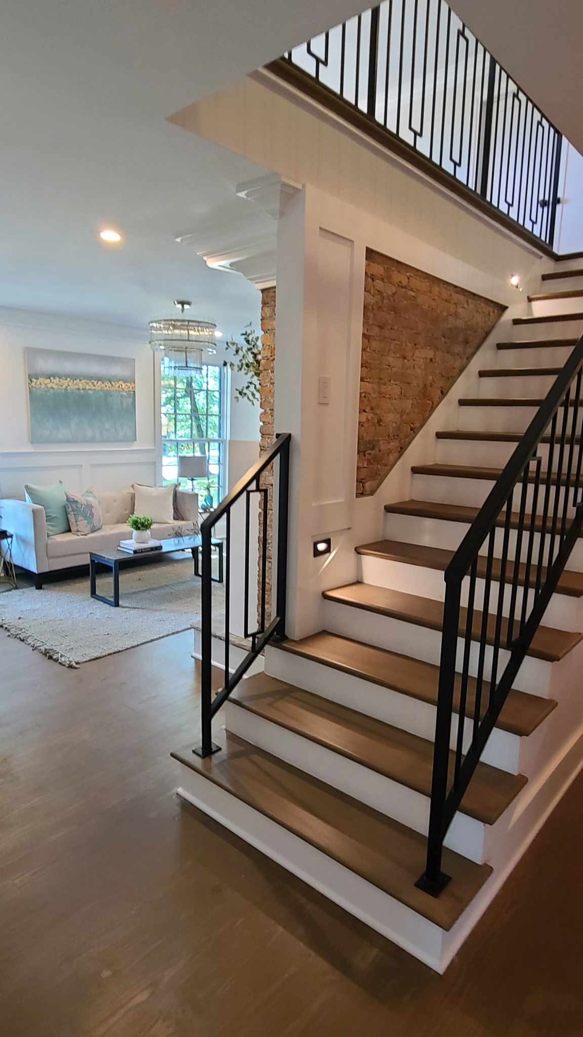 Staircase and interior trim details illustrating renovation possibilities